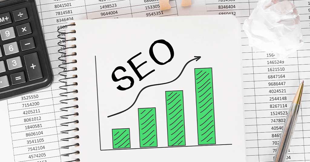 Notebook with a rising chart and the word SEO — the open SEO course